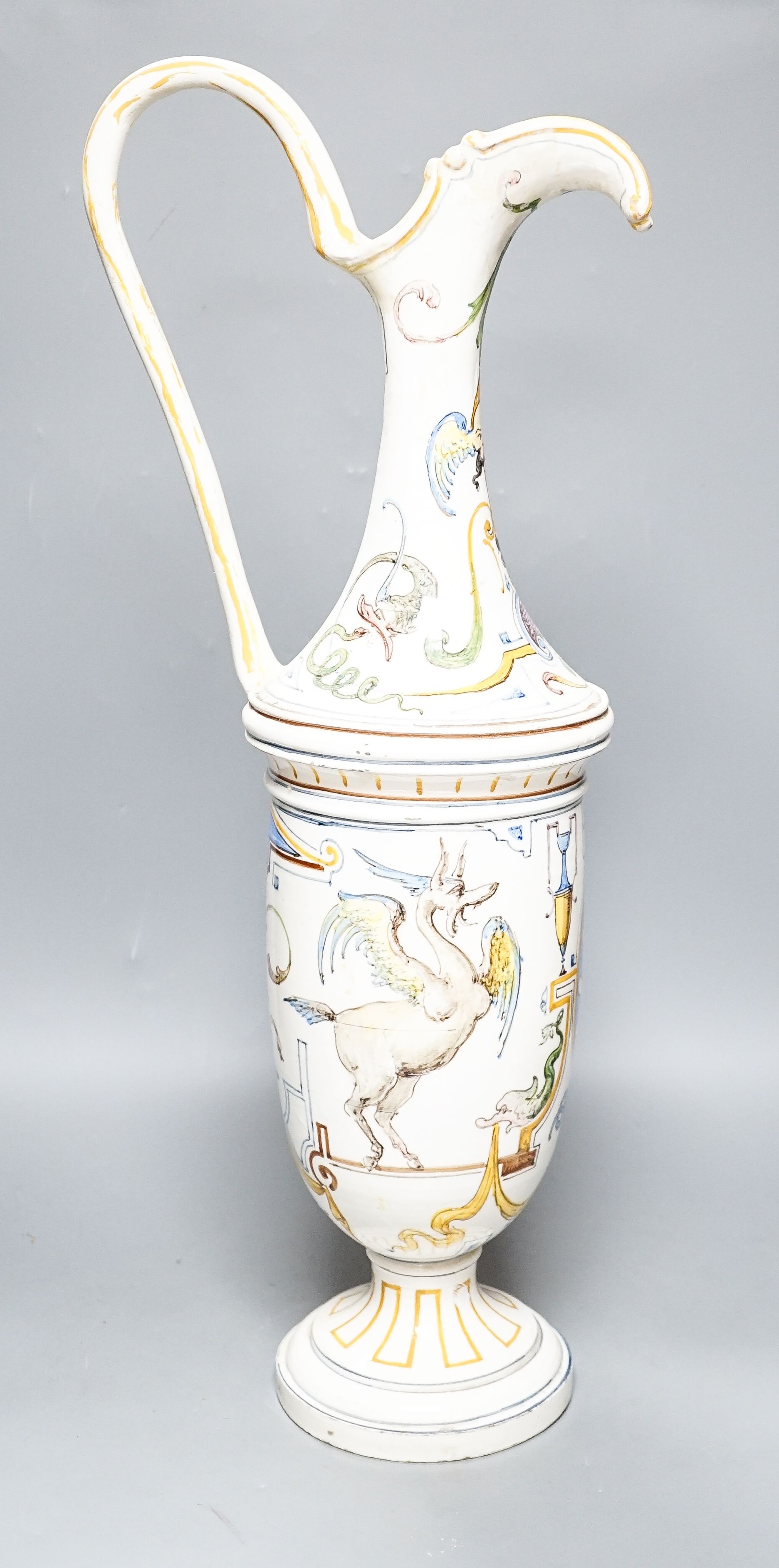 A Quaglino maiolica ewer, four Moroccan pottery dishes and a bowl 62cm